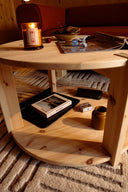 TUCK Coffee table round w. big storage – styled photo 4